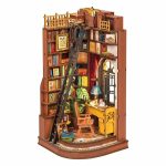 miniature-book-nook-diorama-for-bookshelf Miniature book nook diorama for bookshelf showing detailed desk and bookshelves