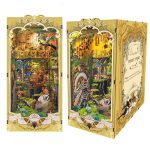 miniature-book-nook-diorama-with-preserved-insect-records Miniature book nook diorama featuring layered foliage and hand-illustrated insect records