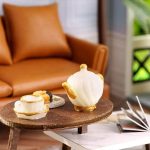 miniature-cottage-diy-kit-with-tiny-furniture-and-accessories Miniature cottage DIY kit with tiny furniture and ceramic accessories for meditative building