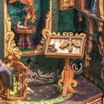 miniature-darkness-themed-book-nook-with-dried-flowers Miniature darkness-themed book nook with dried flowers and preserved botanicals