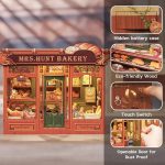 miniature-diorama-book-nook-bakery-with-warm-led-lights Miniature bakery book nook diorama with touch-activated warm amber LED lighting