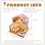 miniature-dollhouse-bakery-kit-with-tiny-sweets Miniature bakery kit with hand-placed candy jars and pastries arranged on wooden shelves
