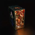 miniature-enchanted-house-book-nook-scene miniature enchanted cottage book nook scene on wooden shelf