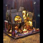 miniature-fairy-house-craft-kit-for-creative-hobbyists Miniature fairy house craft kit for creative hobbyists on a wooden desk