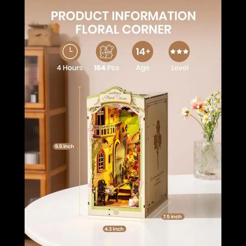miniature-floral-bookshelf-diorama-for-reading-nook Miniature floral bookshelf diorama lit by warm LED for reading nook display