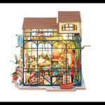 miniature-flower-boutique-model-for-dollhouse-enthusiasts Miniature flower boutique model for dollhouse enthusiasts with chalkboard price tags