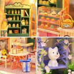 Miniature garden cottage with flower details and decorative botanical elements