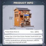 miniature ramen shop book nook inserted between books on shelf