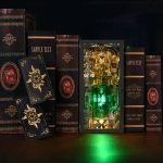 miniature-tarot-book-nook-for-bookshelf Miniature tarot book nook inserted between books on a bookshelf