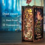 miniature-tree-lined-book-nook-with-led-lighting Miniature tree-lined book nook with LED lighting creating warm glow among novels