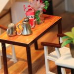 modern-dollhouse-interior-model-with-comfortable-sofa-and-rug Modern dollhouse interior model with comfortable miniature sofa and rug