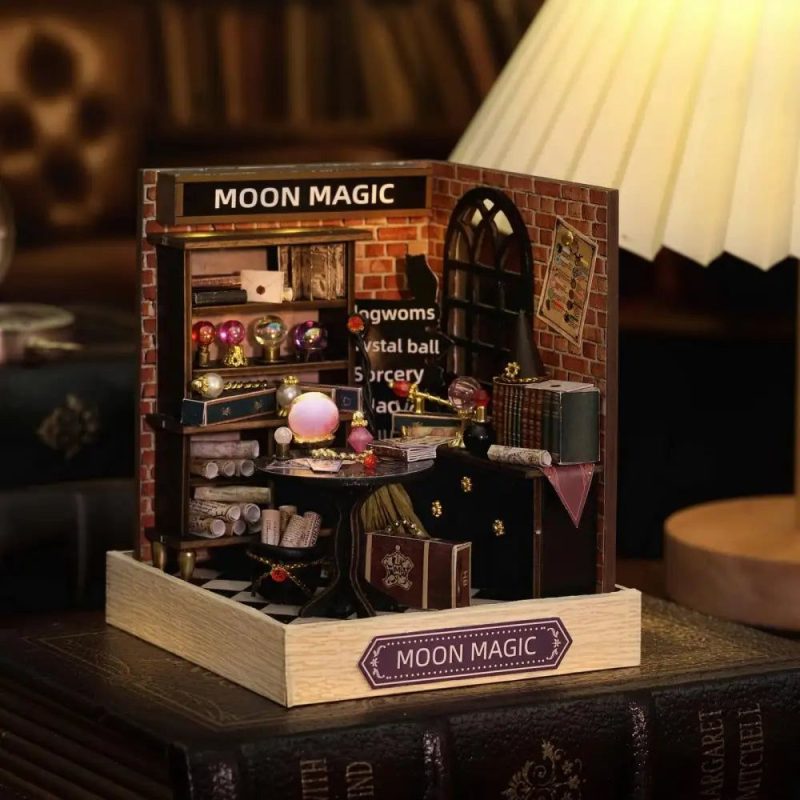 moon-magic-miniature-house-kit Moon Magic miniature house kit assembled lunar cottage on display shelf