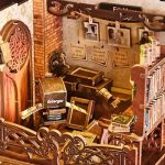 paper-craft-book-nook-kit-with-cinematic-details Paper craft book nook kit with cinematic darkroom details and layered depth