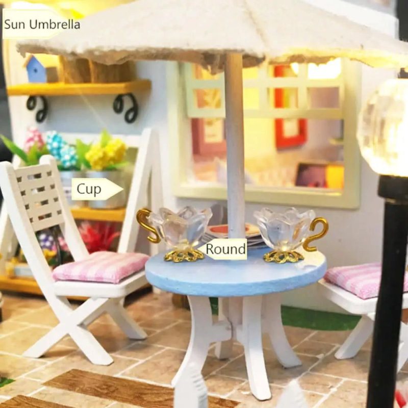 pink-loft-miniature-scene-with-led-lighting-and-furniture Pink Loft miniature scene with LED lighting illuminating tiny furniture and accessories