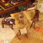realistic-miniature-bookcase-diorama-with-a-cozy-reading-nook Realistic miniature bookcase diorama with cozy reading nook atmosphere and LED ambience