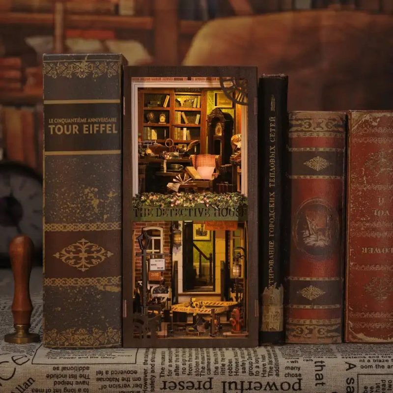 rose-detective-agency-book-nook-kit Rose Detective Agency Book Nook Kit assembled on a wooden shelf between novels