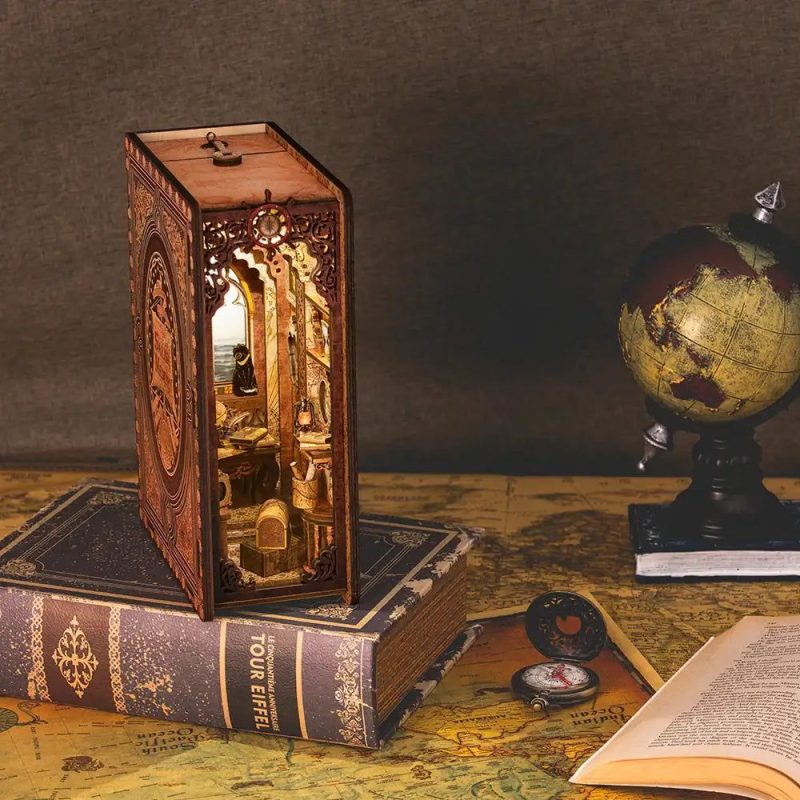 sailing-themed-book-nook-miniature-diorama Sailing-themed book nook miniature diorama with amber LED glow