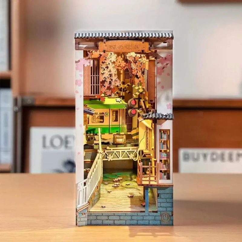 sakura-cherry-blossom-book-nook-diorama-with-train Sakura cherry blossom book nook diorama with Densha train and pink petals