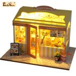 scale-model-dollhouse-boutique-craft-kit Scale model dollhouse boutique kit: completed storefront with interior layering and depth
