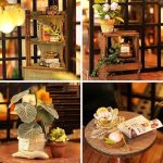 scale-model-forest-teahouse-with-cozy-decor Scale model forest teahouse with cozy interior decor and warm glowing LED accent lighting