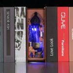 seascape-miniature-with-weathered-ship-and-lighthouse Seascape miniature with weathered ship and lighthouse on bookshelf with LED accent lighting