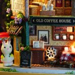 small-dollhouse-theater-kit-ideal-for-hobbyists-and-model-makers small dollhouse theater kit on bookshelf ideal for hobbyists and model makers