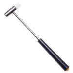 small-precision-hammer-for-diy-craft-projects Small precision hammer seated in hand showing natural grip position between two fingers for delicate miniature craft work