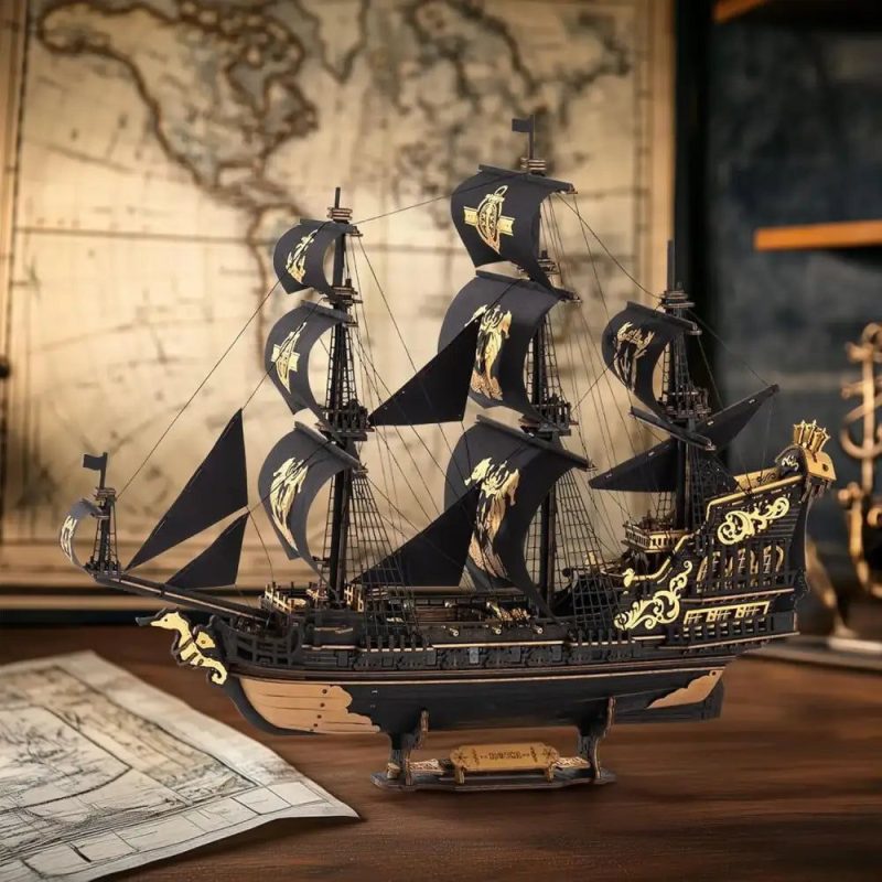 the-seahorse-barque-majestic-3d-wooden-sailing-ship-model-kit The Seahorse Barque wooden ship model kit assembled with black-and-gold sails and golden seahorse crest