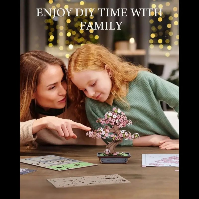 three-dimensional-wooden-sakura-tree-puzzle Three-dimensional wooden Sakura tree puzzle catching natural ambient light on desk