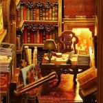 tiny-bookshop-diorama-shelf-accessory-with-cozy-lights Tiny bookshop diorama shelf accessory glowing with cozy warm LED lights at night