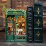 tiny-cozy-book-nook-with-owl-and-stacked-books Tiny cozy book nook diorama with owl accent and stacked miniature books