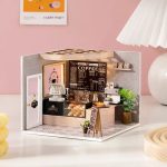 tiny-dollhouse-cafe-with-detailed-furniture-and-decor Tiny café with detailed furniture, windows, and realistic bar counter