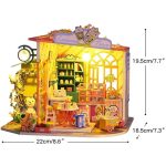 Tiny floral dollhouse assembly kit with pre-cut pieces and painting supplies included