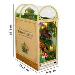 tiny-illuminated-fairytale-forest-diorama-for-readers Tiny illuminated fairytale forest diorama built from Firefly Forest LED glowing book nook kit