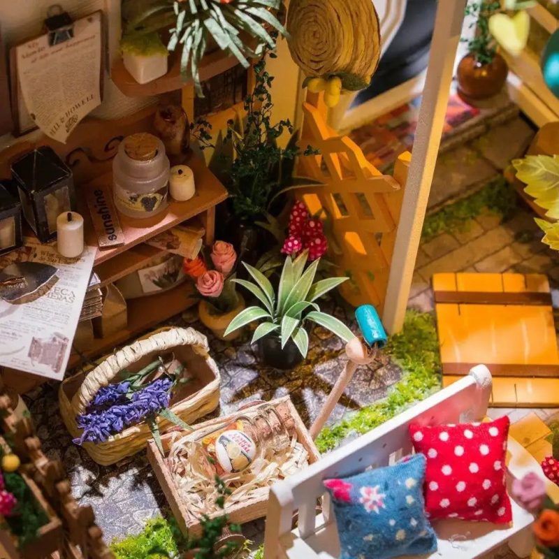 tiny-model-house-with-realistic-garden-accessories Tiny model house with realistic garden accessories and vintage-inspired design