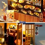 tiny-retail-storefront-miniature-accessories-set Miniature shop kit contents: included wooden pieces, miniature props, signage, and assembly supplies