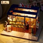 tiny-storefront-dollhouse-diy-kit Tiny storefront dollhouse diy kit: pre-cut wood panels and components ready for assembly