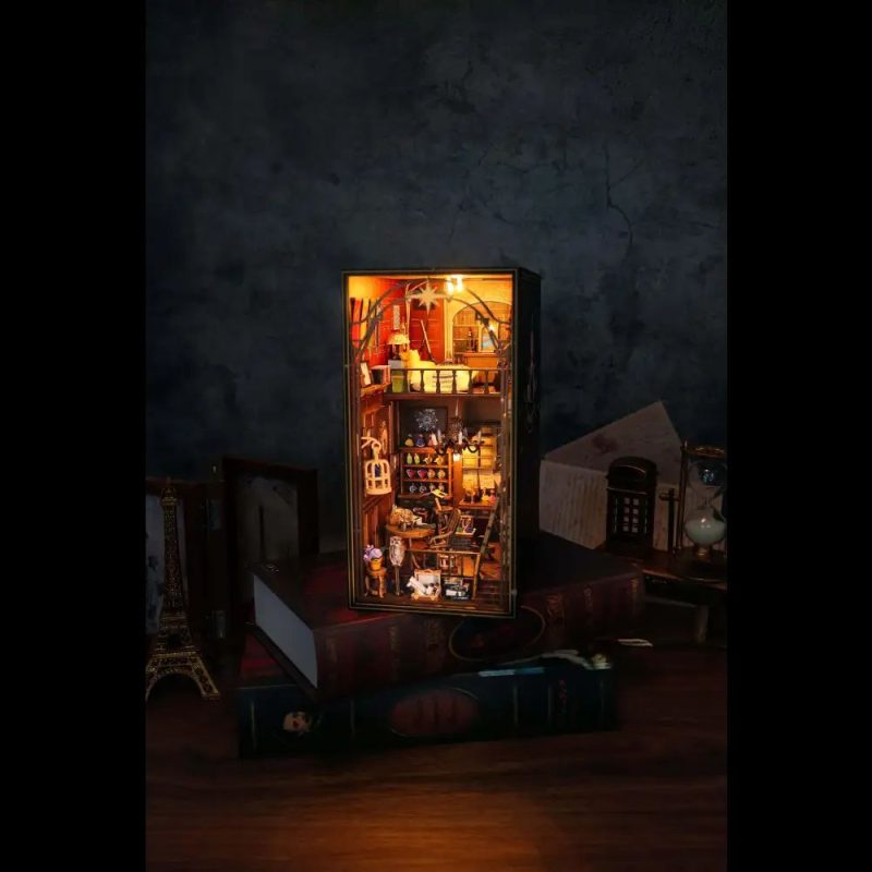 tiny-whimsical-house-bookshelf-scene-with-lights tiny whimsical house bookshelf scene with warm LED lights