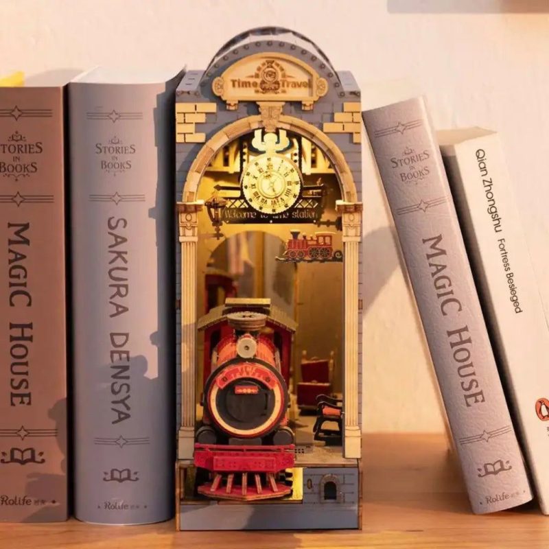 victorian-train-themed-book-nook-diorama-evoking-time-travel Victorian train book nook diorama with atmospheric time-travel depth effect