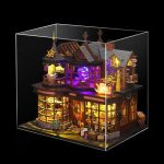 whimsical-miniature-house-decoration-with-led-illumination Whimsical miniature house decoration with LED illumination on a bookshelf display