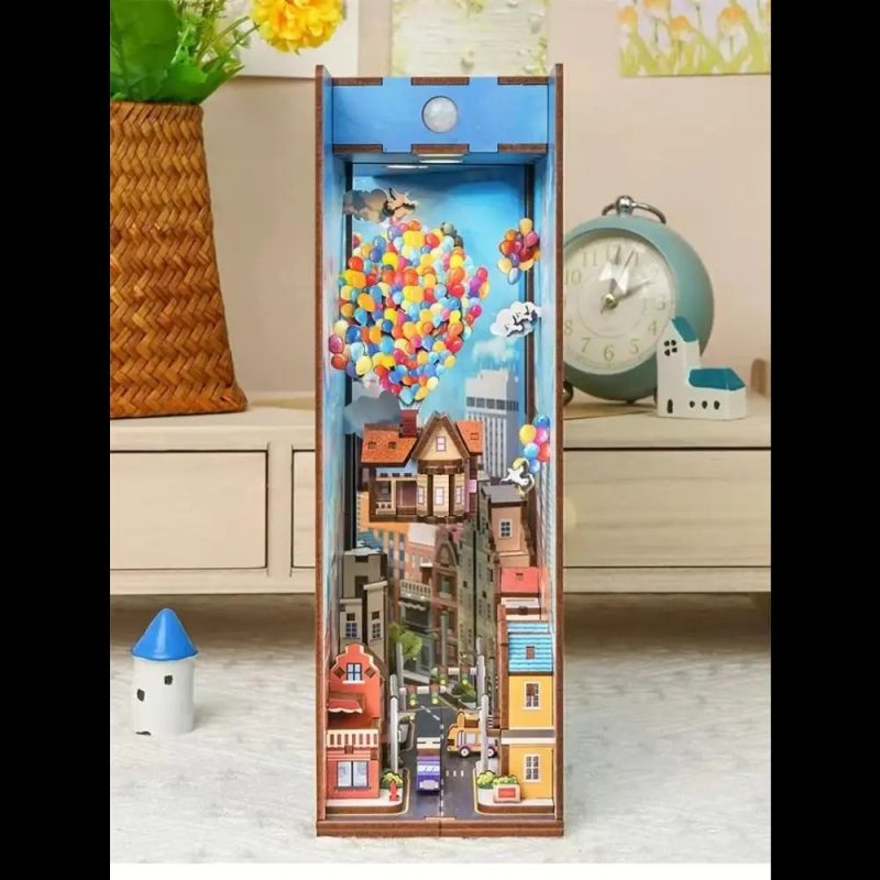 wooden-book-nook-diy-travel-themed-miniature-diorama Wooden book nook DIY travel-themed miniature diorama with painted hot-air balloons and buildings
